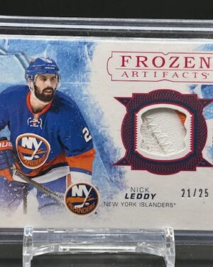2017-18 Upper Deck Artifacts Frozen Artifacts Nick Leddy jersey patch card /25, featuring a game-used Islanders jersey swatch, serial numbered and highly collectible for NHL and Islanders fans.