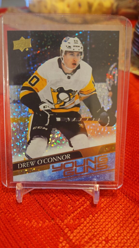 2020-21 Upper Deck Extended Drew O’Connor Young Guns Speckled Foil #728 rookie card, featuring a vibrant foil parallel finish, standout Young Guns rookie status, and Pittsburgh Penguins forward in action from the Extended Series.