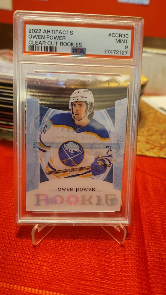 2022 Upper Deck Artifacts Owen Power Clear Cut #CCR30 rookie card, graded PSA 9, featuring a premium acetate design and Buffalo Sabres rookie from the Artifacts set.