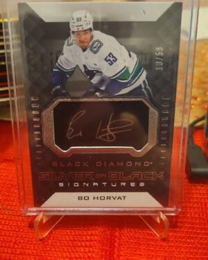 2021-22 Upper Deck Black Diamond Silver on Black Signatures Bo Horvat #SB-BH autograph card, featuring a bold silver ink signature on premium black foil, and Vancouver Canucks captain from the high-end Black Diamond set.