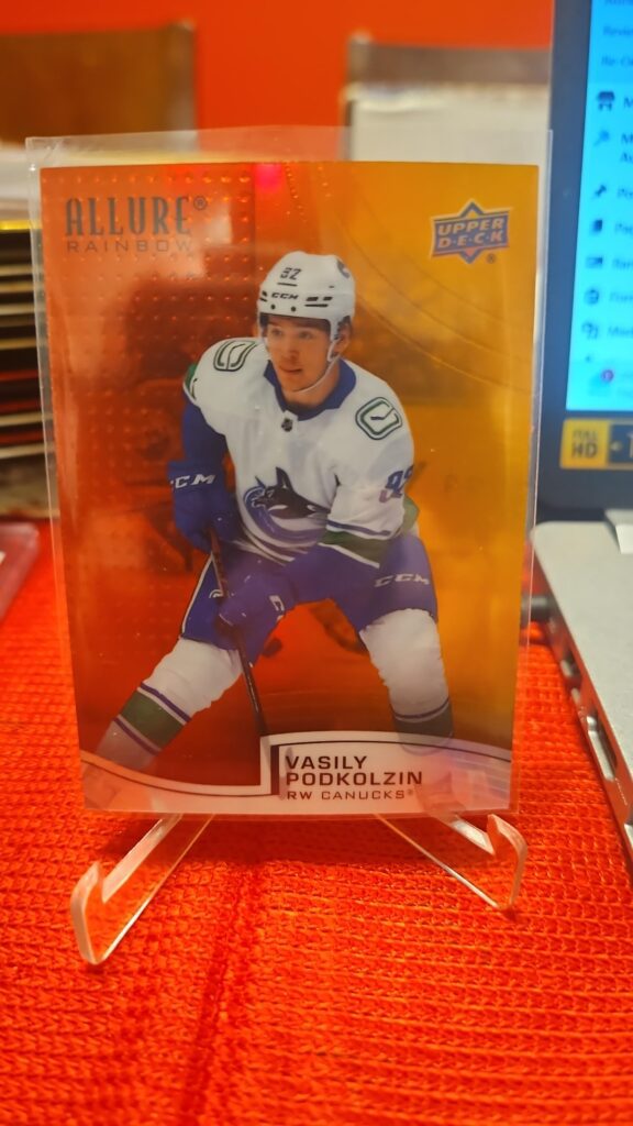 2021-22 Upper Deck Allure Red Orange #R-4 Vasily Podkolzin rookie card, Vancouver Canucks, rare NHL parallel