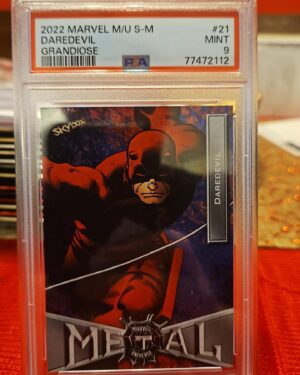 2022 Marvel Metal Universe Daredevil Grandiose #21 card, graded PSA 9, featuring a bold Grandiose parallel finish and Daredevil in dynamic Marvel artwork—highly collectible for Marvel card enthusiasts.