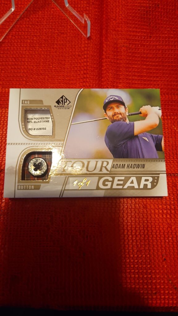 SP Game Used Tour Gear Button / Tag 1/1 Adam Hadwin #TG-AH memorabilia card with authentic gear piece