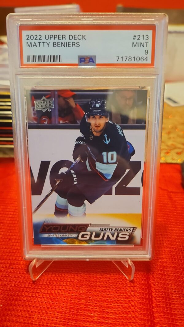 2022-23 Upper Deck Young Guns Matty Beniers #213 rookie card, PSA 9 graded, featuring Seattle Kraken star and iconic Young Guns design, perfect for collectors.