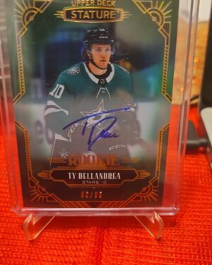 2020-21 Upper Deck Stature Green /85 rookie card #180 featuring Ty Dellandrea of the Dallas Stars, a premium limited parallel highly sought after by NHL collectors and rookie card enthusiasts.