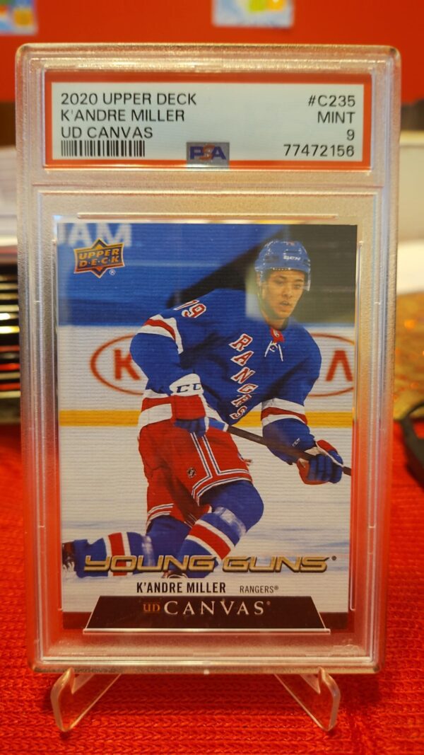 2021 Upper Deck Young Guns Canvas rookie card #C235 featuring K’Andre Miller of the New York Rangers, graded PSA 9, a premium parallel highly sought after by NHL collectors.