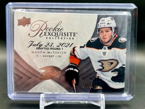 2021-22 Exquisite Collection Rookie card #07R-MM of Mason McTavish, serial numbered to 299, featuring the Anaheim Ducks top prospect in a premium, limited-edition design highly sought after by NHL collectors.