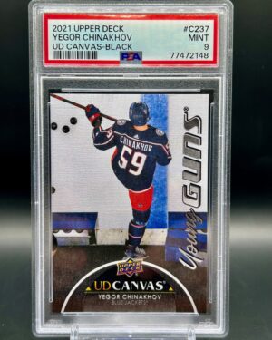2021 Upper Deck Young Guns Canvas Black rookie card #C237 featuring Yegor Chinakhov of the Columbus Blue Jackets, graded PSA 9, a rare parallel highly sought after by NHL rookie card collectors.