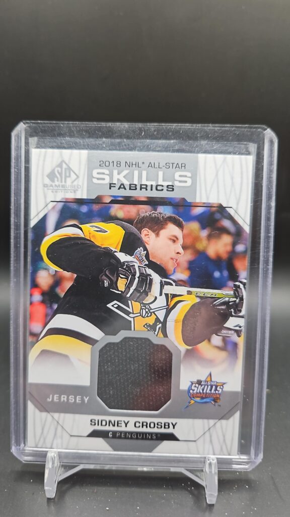 2018-19 Upper Deck SP Game Used All-Star Skills Fabrics card #AS-SC featuring Sidney Crosby of the Pittsburgh Penguins, an authentic game-used memorabilia card highly sought after by NHL collectors.