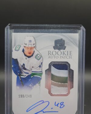 2020-21 The Cup Olli Juolevi RPA RC Auto Patch /249 with on-card autograph and premium patch for Vancouver Canucks collectors.