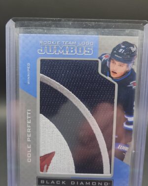2021-22 Upper Deck Black Diamond Rookie Team Logo Jumbo Cole Perfetti #RTL-CP, featuring a jumbo manufactured Winnipeg Jets patch insert from the Black Diamond series, perfect for rookie and NHL collectors.