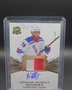 2020-21 Upper Deck The Cup K’Andre Miller Signature Materials Rookie Patch Auto /99, featuring a bold on-card autograph and a vibrant multi-color New York Rangers patch, serial numbered out of 99, from Upper Deck’s high-end The Cup set.