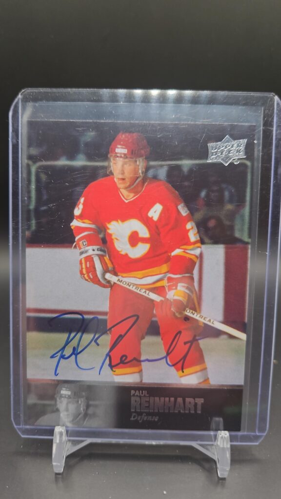 2020-21 SP Signature Legends '97 Legends Signatures Paul Reinhart Auto #AL-224 card featuring Calgary Flames legend, hard-signed autograph, and premium design for collectors.