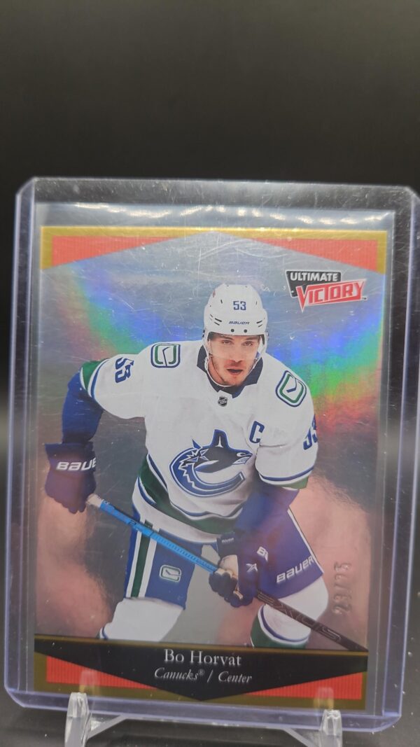 2020-21 Upper Deck Extended Series Ultimate Victory Gold /25 Bo Horvat #UV-19 card featuring Vancouver Canucks captain, premium gold foil, and limited to 25 copies for serious collectors.