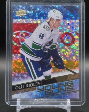2020-21 Upper Deck Young Guns Speckled Rainbow Olli Juolevi #222 rookie card, featuring a vibrant foil parallel finish, standout Young Guns rookie status, and Vancouver Canucks defenseman in action from the 2020-21 set.