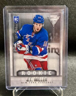 2013-14 Panini Titanium Rookie card #151 featuring J.T. Miller of the New York Rangers, serial numbered to 299, a limited and highly collectible NHL rookie card sought after by hockey fans and collectors.