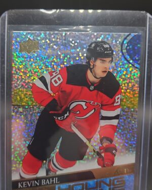 2020-21 Upper Deck Extended Series Young Guns Speckled Rainbow Foil Kevin Bahl #720 rookie card featuring New Jersey Devils defenseman, rare parallel, and vibrant finish.