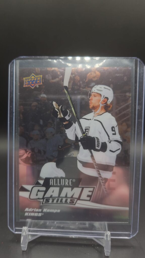 2022-23 Upper Deck Allure Game Stills Adrian Kempe #GS-3 featuring LA Kings forward in action.