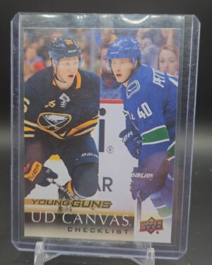 2018-19 Upper Deck Series 2 Young Guns Canvas Checklist rookie card featuring Elias Pettersson and Rasmus Dahlin, Mint condition, top collectible for NHL, Vancouver Canucks, and Buffalo Sabres collectors.
