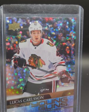 2020-21 Upper Deck Young Guns Speckled Rainbow Lucas Carlsson rookie card #212, Mint condition, Chicago Blackhawks, top collectible NHL rookie card.