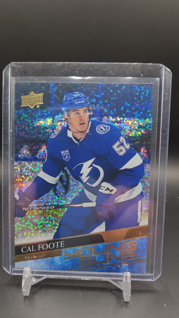 2020-21 Upper Deck Series 2 Young Guns Speckled Rainbow Foil rookie card #476 featuring Cal Foote of the Tampa Bay Lightning, a rare parallel highly sought after by NHL rookie card collectors.