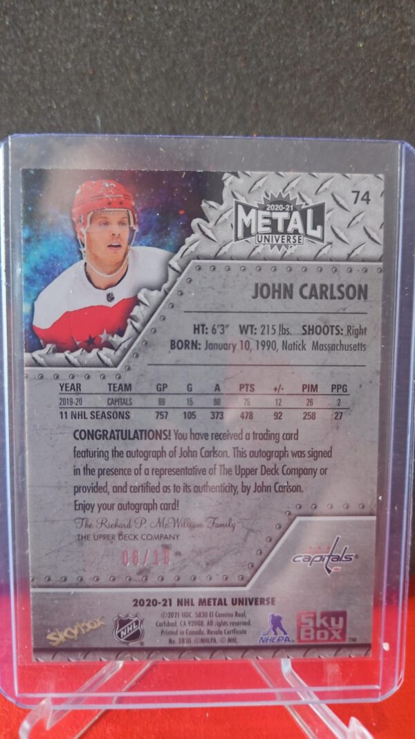 2021-22 Skybox Metal Universe Green Auto /10 John Carlson #74 - Image 2