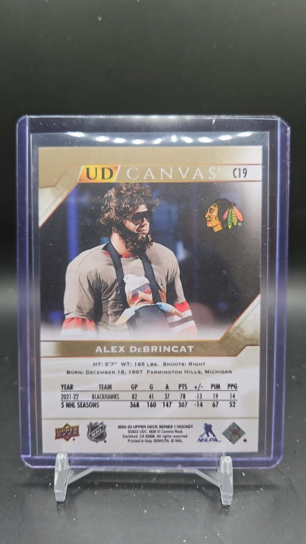 2022-23 Series 1 UD Canvas #C19 Alex DeBrincat - Chicago Blackhawks - Image 2