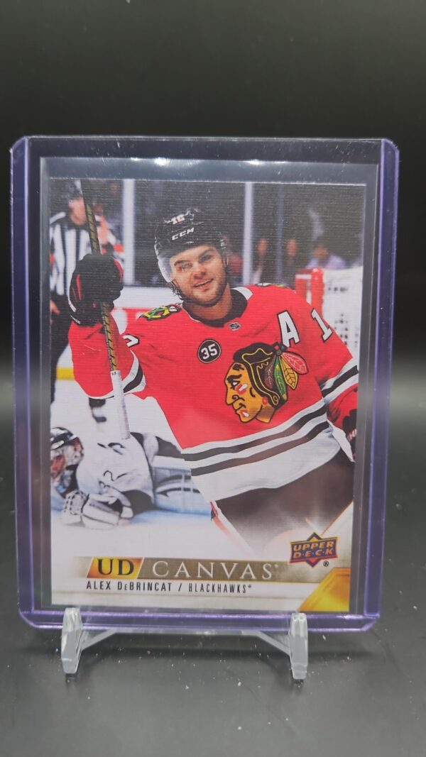 2022-23 Series 1 UD Canvas #C19 Alex DeBrincat - Chicago Blackhawks