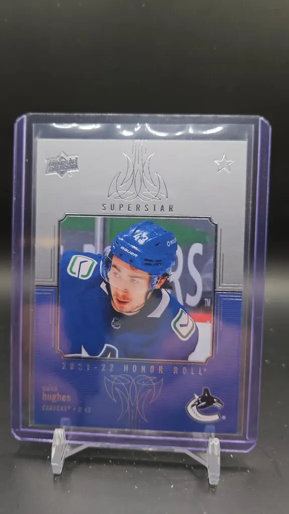 2021-22 UD Series 1 Honor Roll Quinn Hughes #HR-40 card, featuring Quinn Hughes in Vancouver Canucks uniform, a key collectible for hockey card enthusiasts.