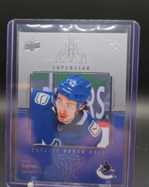 2021-22 UD Series 1 Honor Roll Quinn Hughes #HR-40 card, featuring Quinn Hughes in Vancouver Canucks uniform, a key collectible for hockey card enthusiasts.