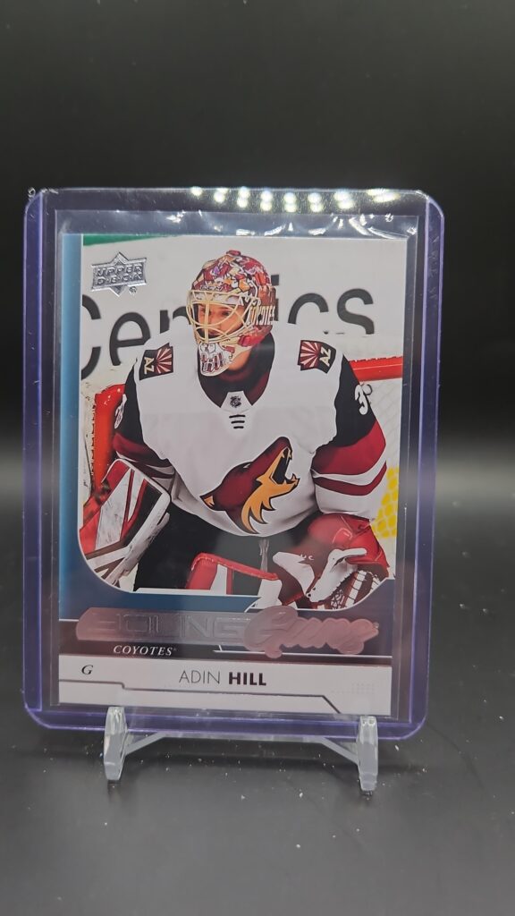 2017-18 Upper Deck Series 2 Young Guns Adin Hill #454 rookie card featuring Arizona Coyotes goaltender, iconic Young Guns design, and strong collector appeal.