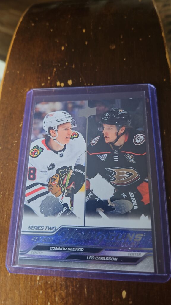 Connor Bedard and Leo Carlsson 2023-24 Upper Deck Series 2 Young Guns Checklist RC #500 hockey card front