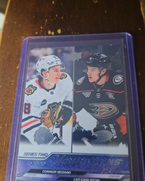 Connor Bedard and Leo Carlsson 2023-24 Upper Deck Series 2 Young Guns Checklist RC #500 hockey card front