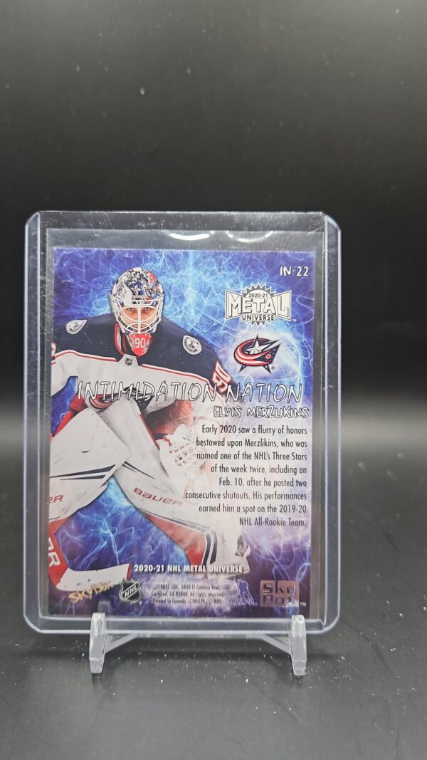 Elvis Merzlikins 2020-21 SKYBOX Metal INTIMIDATION NATION#IN-22 - Image 2