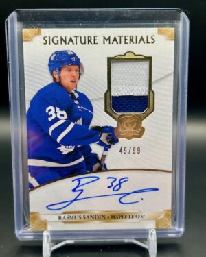 2019-20 Upper Deck The Cup Rasmus Sandin Signature Materials Patch Auto 49/99, featuring a bold on-card autograph and a vibrant multi-color Toronto Maple Leafs patch, premium rookie memorabilia card from The Cup series.