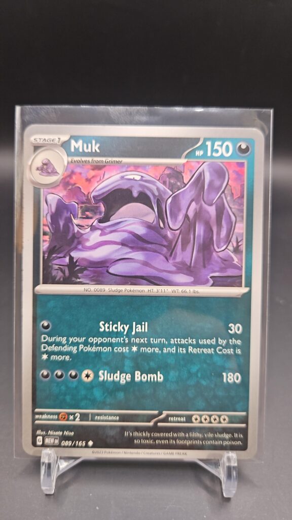 Front face of Muk 089/165 Uncommon card from the English Pokémon Scarlet & Violet 151 base set