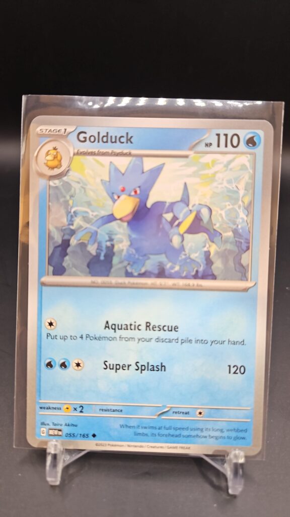Standard non-holo Golduck card from the Pokémon Scarlet and Violet 151 trading card game expansion set showing a silver border, Water-type icon, 110 HP, Entrap attack, and Aqua Edge attack.