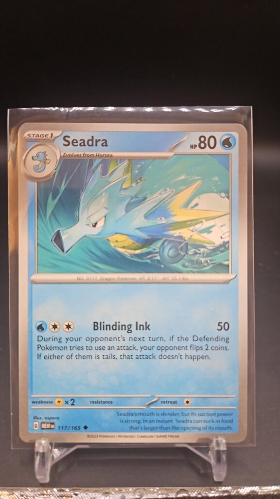 Standard non-holo Seadra card from the Pokémon Scarlet and Violet 151 trading card game expansion set showing a silver border, Water-type icon, 90 HP, and Water Arrow attack.