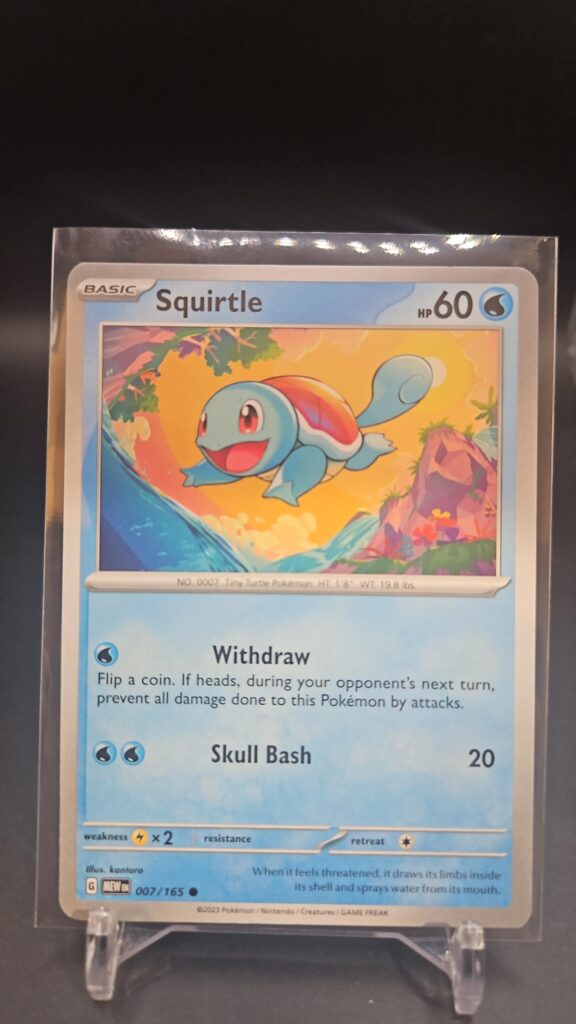 Standard non-holo Squirtle card from the Pokémon Scarlet and Violet 151 trading card game expansion set showing a silver border, Water-type icon, 60 HP, Withdraw attack, and Skull Bash attack.