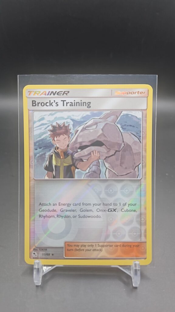 Brock’s Training 55/68 Reverse Holo Hidden Fates Pokémon TCG Card Front
