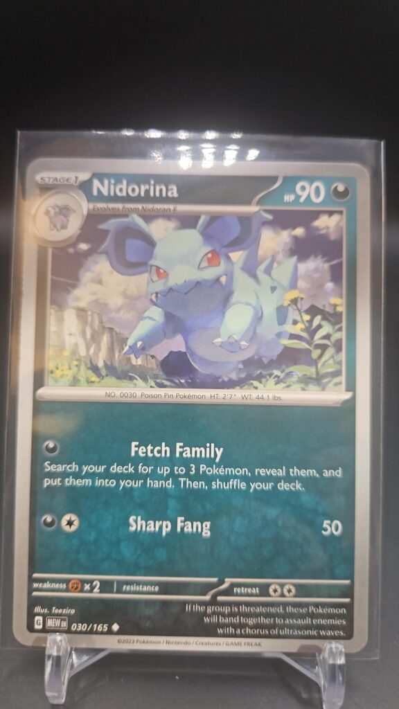 Standard non-holo Nidorina card from the Pokémon Scarlet and Violet 151 trading card game expansion set showing a silver border, Darkness-type icon, 90 HP, Fetch attack, and Sharp Fang attack.