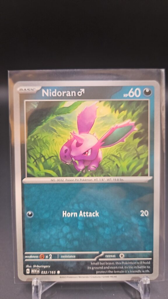 Standard non-holo Nidoran M card from the Pokémon Scarlet and Violet 151 trading card game expansion set showing a silver border, Darkness-type icon, 60 HP, Horn Attack, and Poison Horn attack.