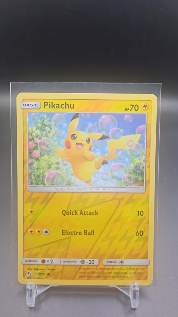 Pokémon TCG Pikachu 19/68 Hidden Fates 2019 Reverse Holo Foil card displayed in near mint condition, showcasing classic Pikachu illustration, bright reverse holo shine, and collectible finish for fans.