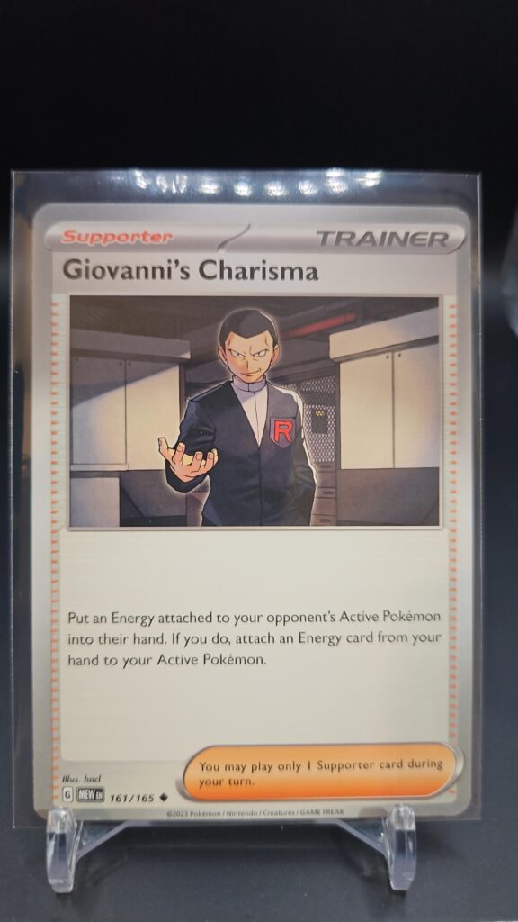 Full-art holographic Giovanni's Charisma Supporter card from the Pokémon Scarlet and Violet 151 trading card game expansion set showing a silver border, textured artwork, and energy transfer card effect.