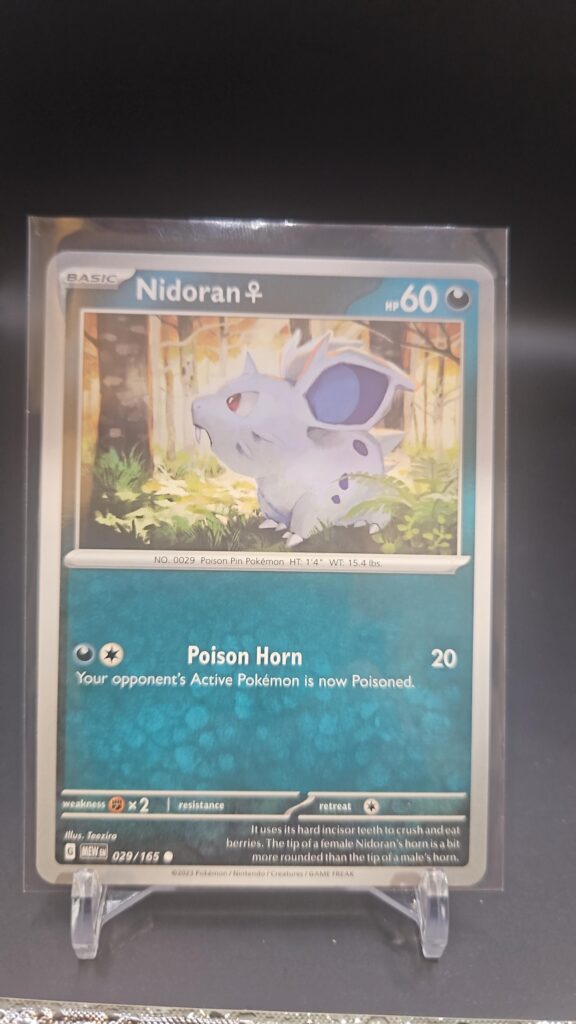 Standard non-holo Nidoran F card from the Pokémon Scarlet and Violet 151 trading card game expansion set showing a silver border, Darkness-type icon, 60 HP, Poison Payback attack, and Claw Slash attack.