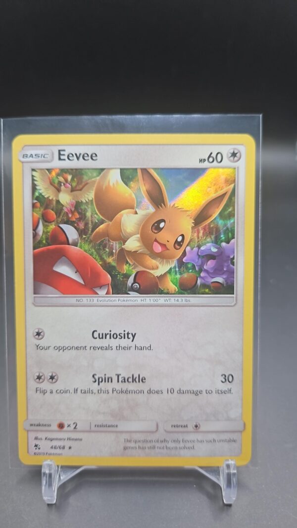 Eevee 48/68 NM Hidden Fates - Holo Rare Pokemon Card Near Mint