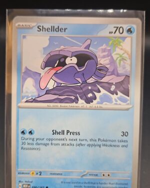 Shellder 090/165 from Scarlet & Violet 151, English Pokémon card, common rarity, featuring playful artwork and collector appeal