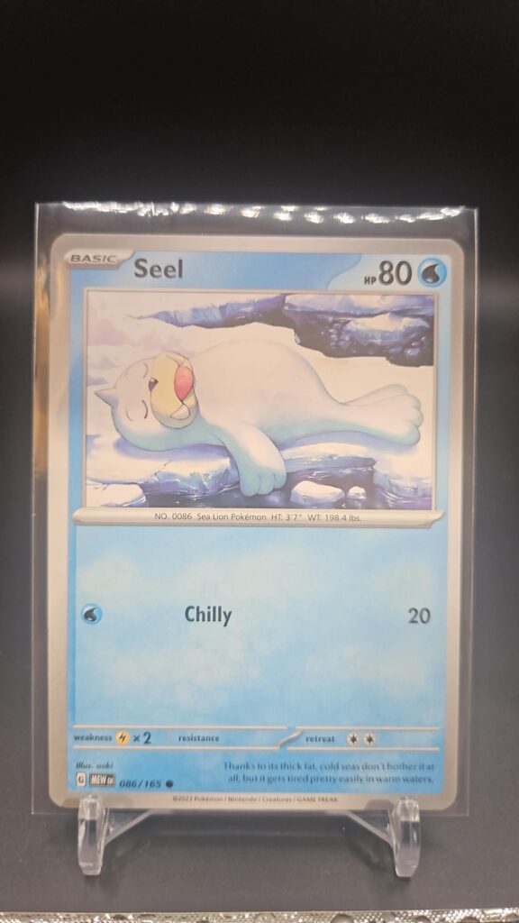 2023 Pokémon Scarlet and Violet 151 Seel 086/165 common card, featuring classic water-type artwork and collector appeal, ideal for Pokémon TCG set completion.