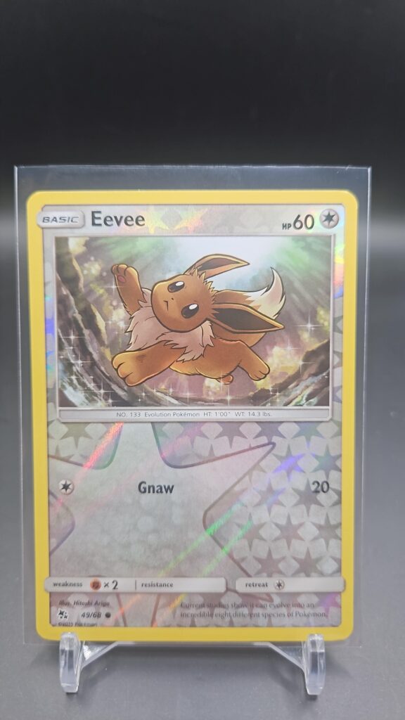 Eevee 49/68 Reverse Holo Hidden Fates Pokémon Card Front
