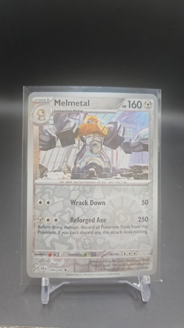 Melmetal 104/142 Reverse Holo Pokemon Stellar Crown